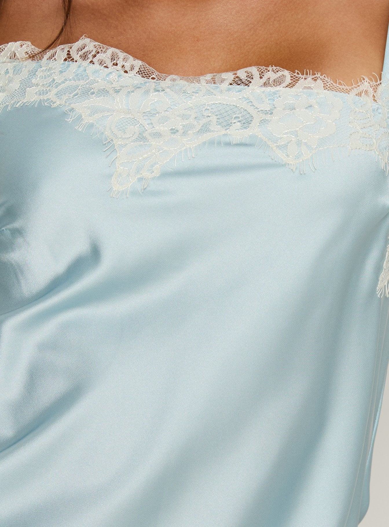 Winta Lace Trim Asymmetrical Satin Top Blue - Image 6